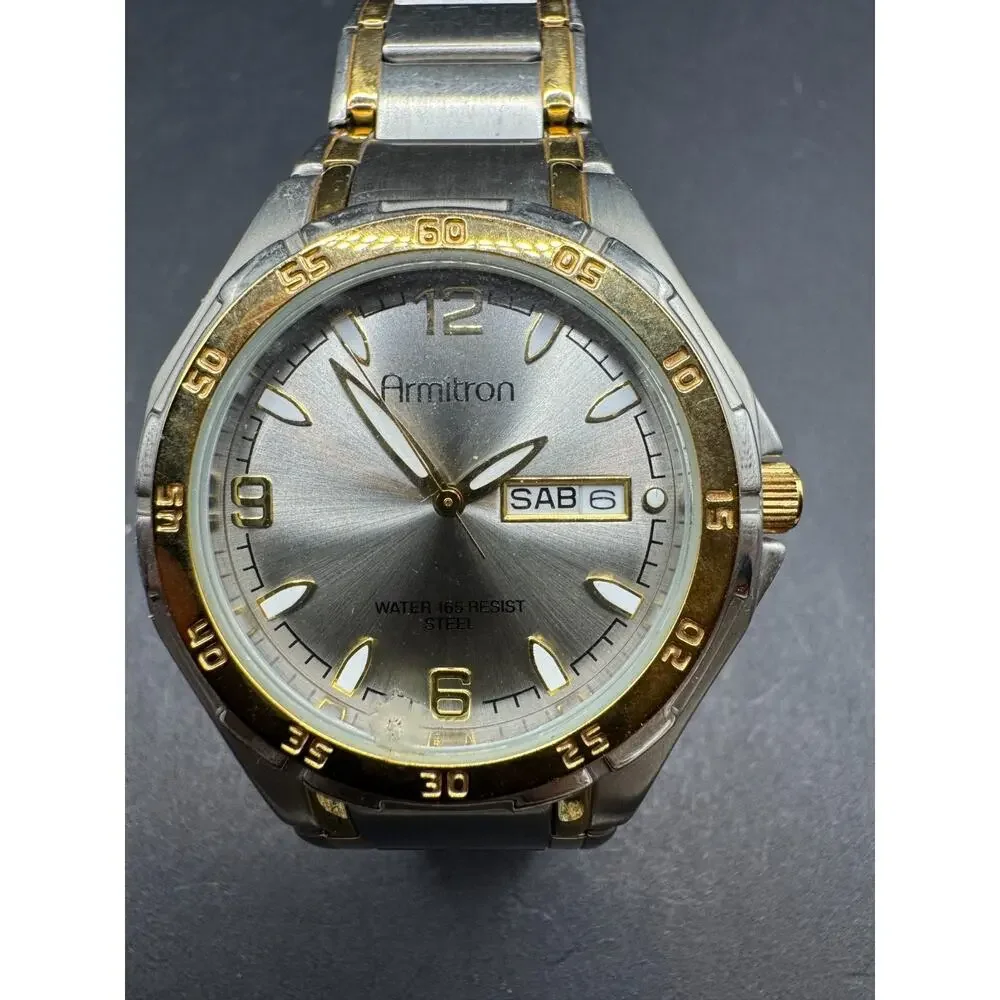 Armitron Men's 20/4309TT Two-Tone Stainless Steel Round Dial Day/date Watch